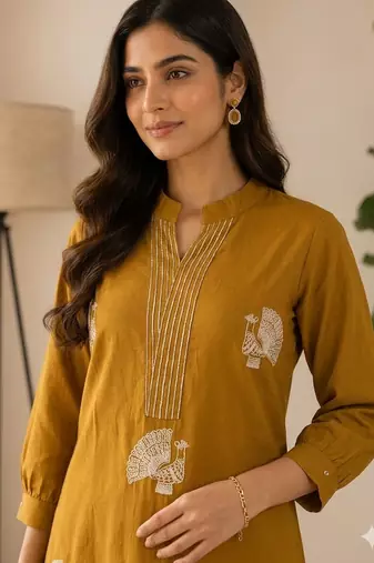 Women mustard cotton printed kurta with trousers co-ord set
