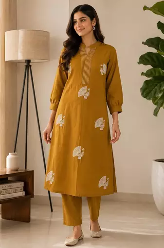 Women mustard cotton printed kurta with trousers co-ord set