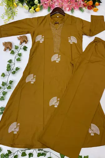 Women mustard cotton printed kurta with trousers co-ord set