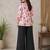 Women white & rani pink bold floral printed cotton kurti with black wide-leg palazzo set