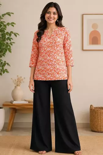 Womens new trendy orange floral printed short kurti with beige palazzo set