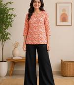 Womens new trendy orange floral printed short kurti with beige palazzo set