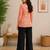 Womens new trendy orange floral printed short kurti with beige palazzo set