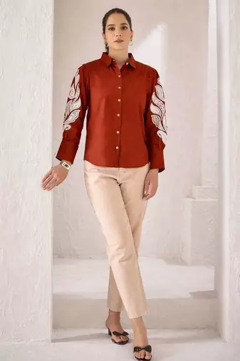 Women trendy rust cotton button-down top with white contrast embroidered sleeves