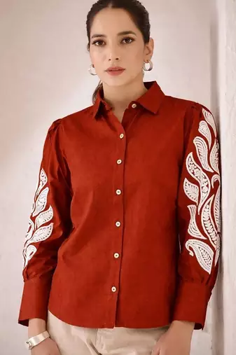 Women trendy rust cotton button-down top with white contrast embroidered sleeves