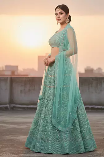 Light Green Net Embroidered Lehenga With Choli And Net Dupatta