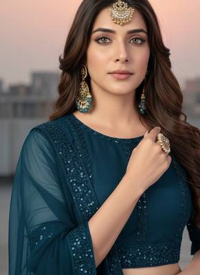 Teal Net Embroidered Lehenga With Choli And Net Dupatta 4