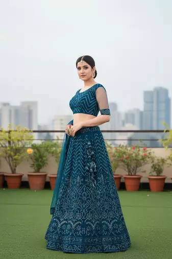Teal Net Embroidered Lehenga With Choli And Net Dupatta
