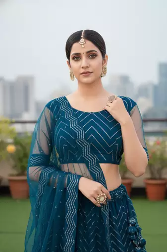 Teal Net Embroidered Lehenga With Choli And Net Dupatta