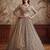 Gorgeous Beige Sequins Net Engagement Wear Lehenga Choli With Dupatta