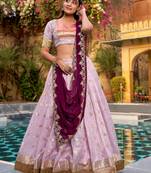 Captivating Lavender Embroidered Silk Marriage Wear Lehenga Choli