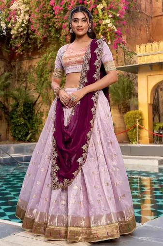 Captivating Lavender Embroidered Silk Marriage Wear Lehenga Choli