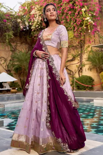 Captivating Lavender Embroidered Silk Marriage Wear Lehenga Choli