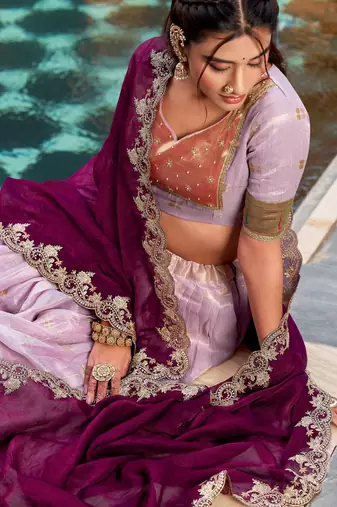 Captivating Lavender Embroidered Silk Marriage Wear Lehenga Choli