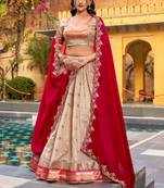 Fashionable Cream Zari Weaving Silk Wedding Wear Lehenga Choli