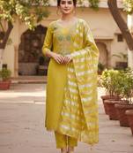 Mustard color modal butti fabric woven and embroidered ethnic suit for girls