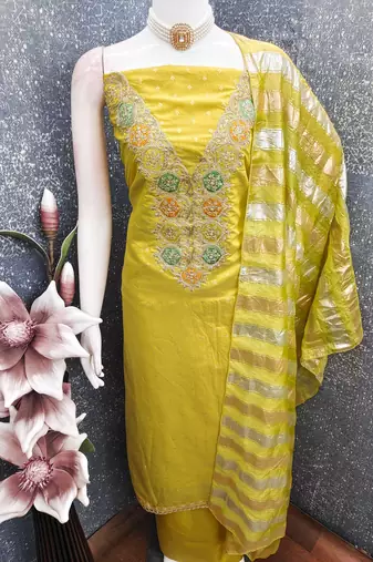 Mustard color modal butti fabric woven and embroidered ethnic suit for girls