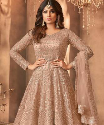 Beige color bollywood style designer anarkali dress for ceremonial looks 2