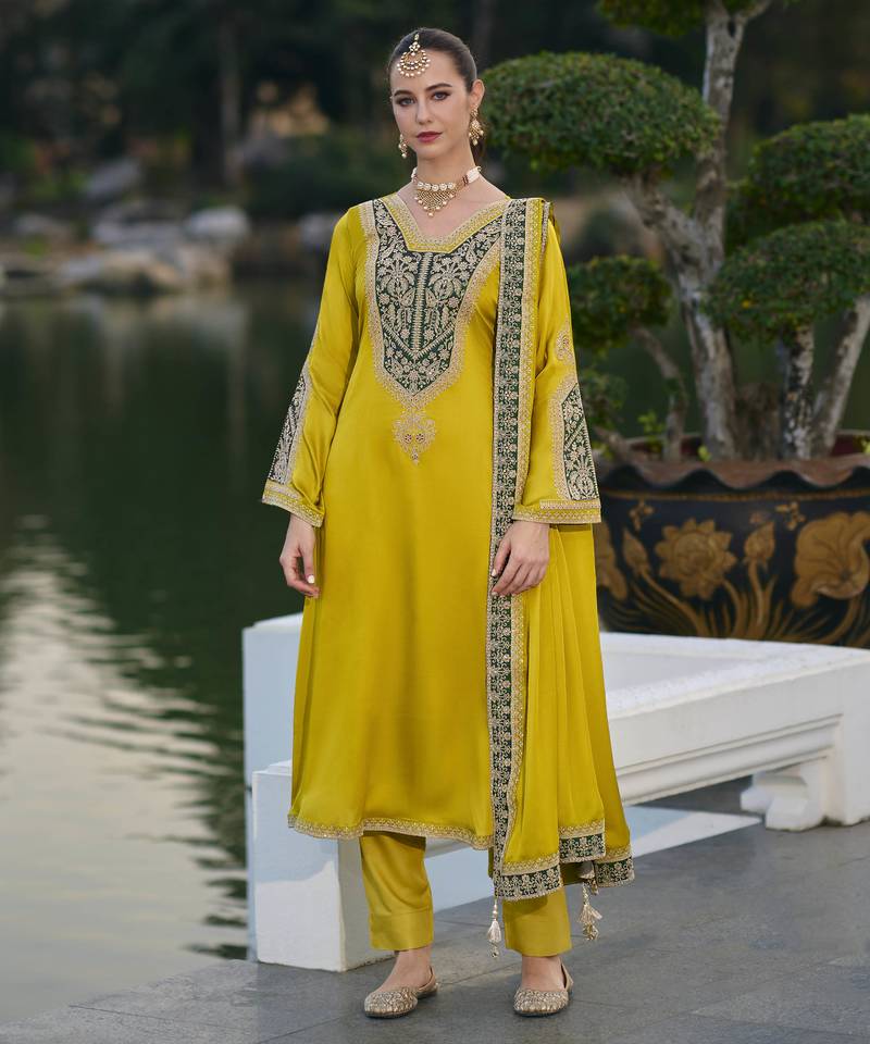 Yellow color gajji silk fabric designer embroidery work graceful ceremonial wear salwar kameez