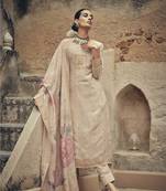 Cream color silk cotton fabric designer partywear ethnic ceremonial suit