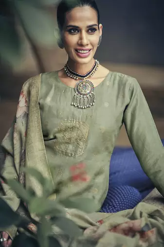 Green color silk cotton fabric designer partywear ethnic ceremonial suit