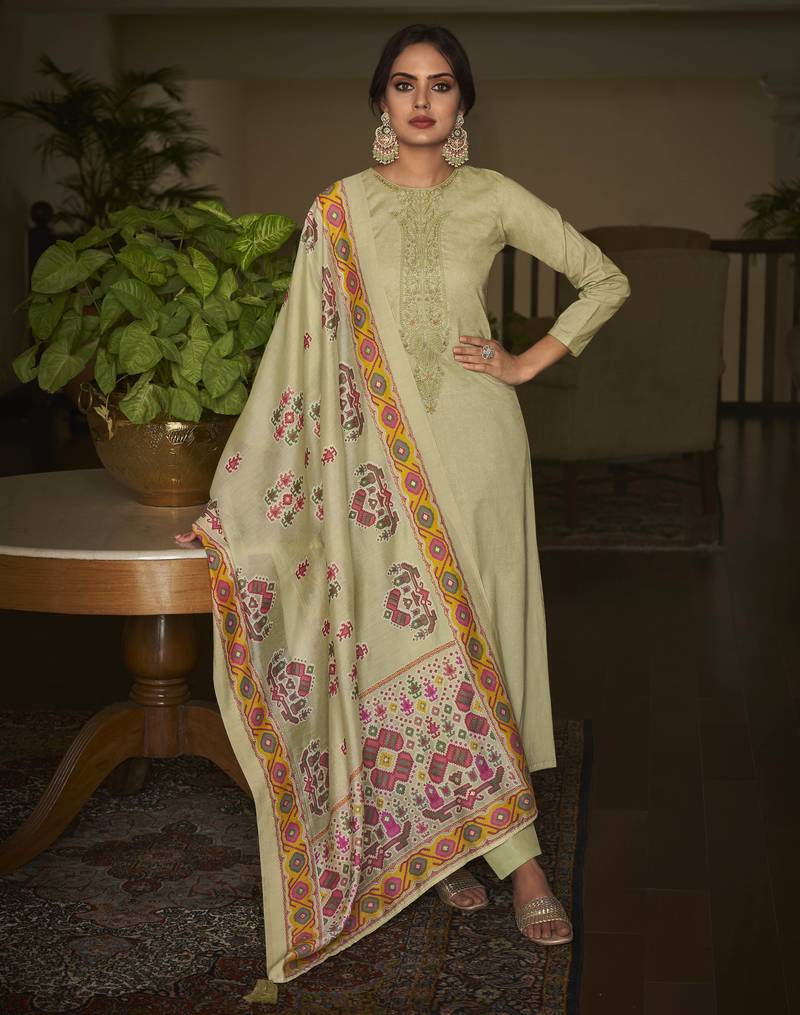 Beige color cambric cotton fabric beautiful ceremonial salwar kameez for graceful looks