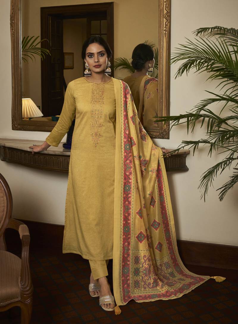 Yellow color cambric cotton fabric beautiful ceremonial salwar kameez for graceful looks