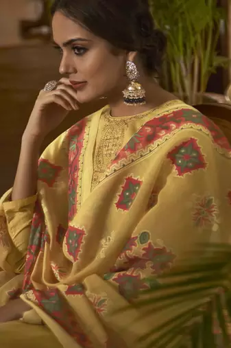 Yellow color cambric cotton fabric beautiful ceremonial salwar kameez for graceful looks