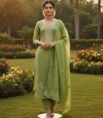 Green color graceful partywear ethnic dani cotton fabric suit for girls