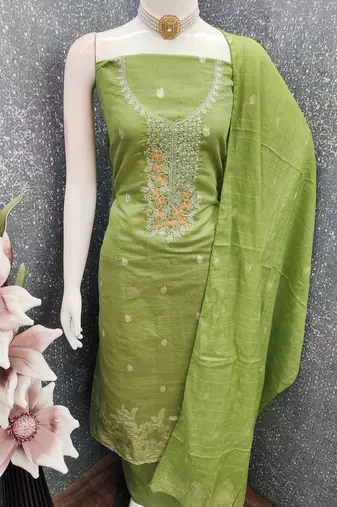 Green color graceful partywear ethnic dani cotton fabric suit for girls