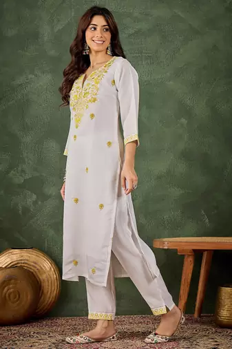 yellow fancy silk blend kurta set