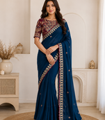 teal embroidery with sequins silk saree
