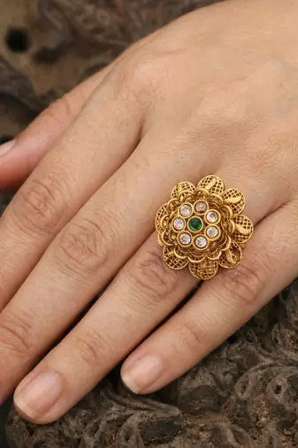 Antique floral kundan adjustable ring with green stone and white crystal accents