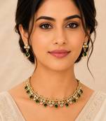 Elegant emerald green kundan necklace set with drop earrings for women