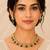 Elegant emerald green kundan necklace set with drop earrings for women