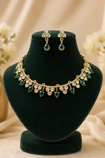Elegant emerald green kundan necklace set with drop earrings for women
