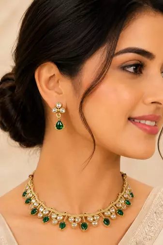 Elegant emerald green kundan necklace set with drop earrings for women