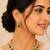 Elegant emerald green kundan necklace set with drop earrings for women