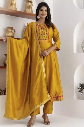 yellow fancy silk kurta set