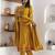 yellow fancy silk kurta set