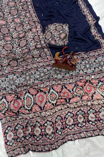 neavy blue ajarakh print with mirror and beautiful tussle crepe silk saree