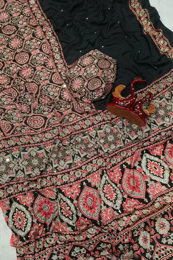 black ajarakh print with mirror and beautiful tussle crepe silk saree