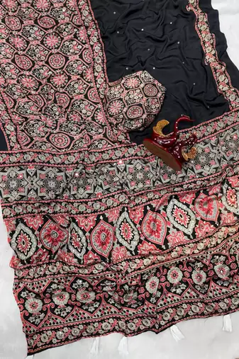 black ajarakh print with mirror and beautiful tussle crepe silk saree