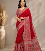 red ajarakh print with mirror and beautiful tussle crepe silk saree