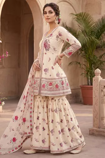 Designer wedding wear cream crepe silk printed embroidery peplum sharara set
