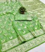 Light green zari woven banarasi silk blend saree with blouse piece