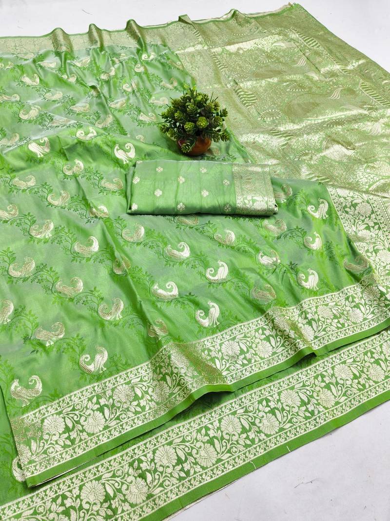 Light green zari woven banarasi silk blend saree with blouse piece