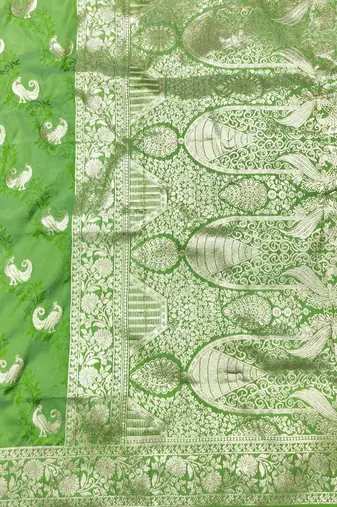 Light green zari woven silk blend saree with blouse piece