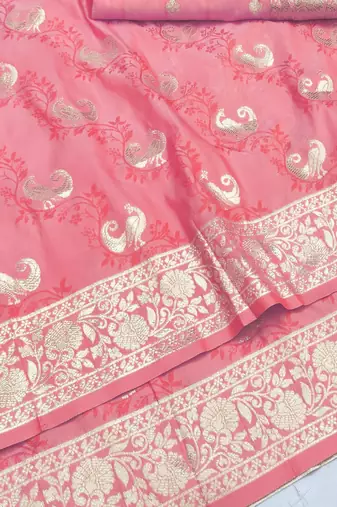 Pink zari woven silk blend saree with blouse piece