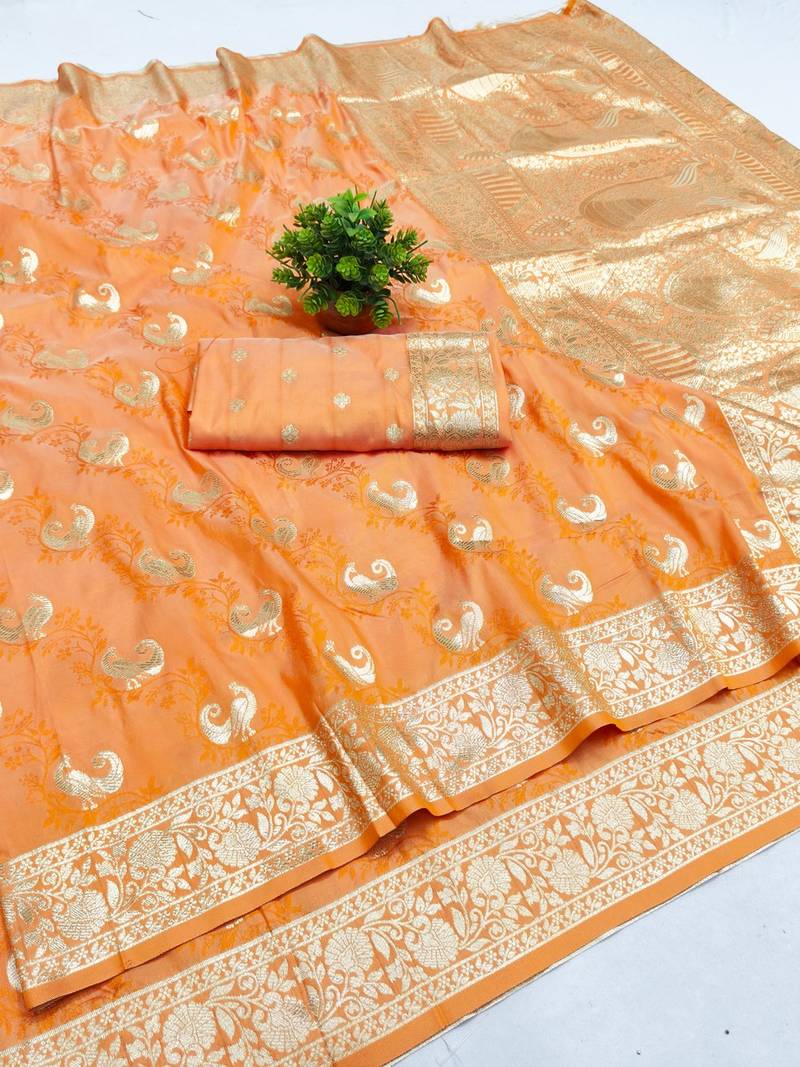 Orange zari woven banarasi silk blend saree with blouse piece